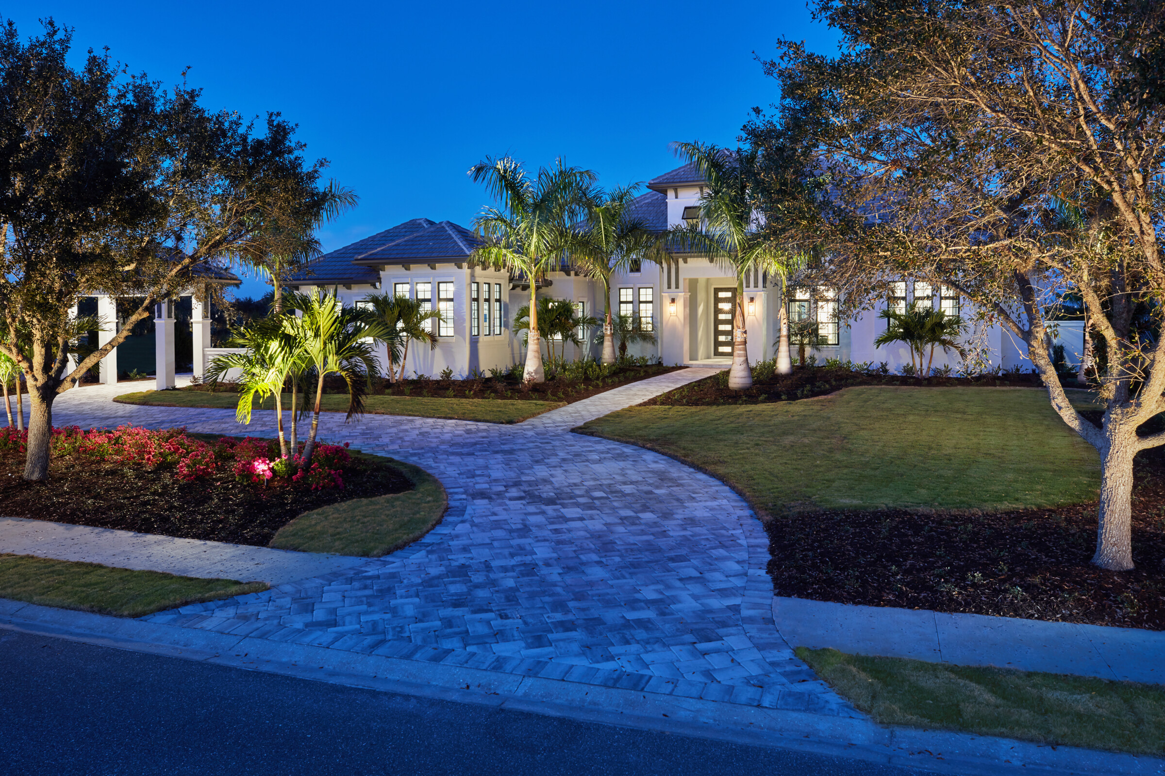 STOCK CUSTOM HOMES SELLS TWO GRAND ESTATES IN THE PREMIER LAKEWOOD RANCH VILLAGE, THE LAKE CLUB